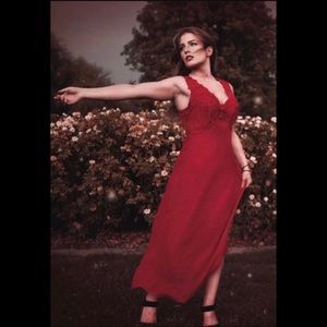 Beautiful vintage women’s red maxi slip with embellishing on breast area.